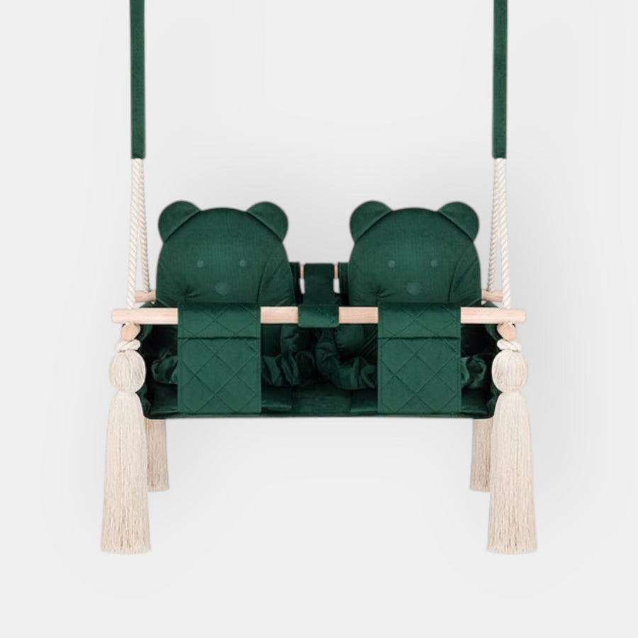 Balançoire double jumeaux en bois pour intérieur, vert, vue de face avec siège double, barre en bois et pompons